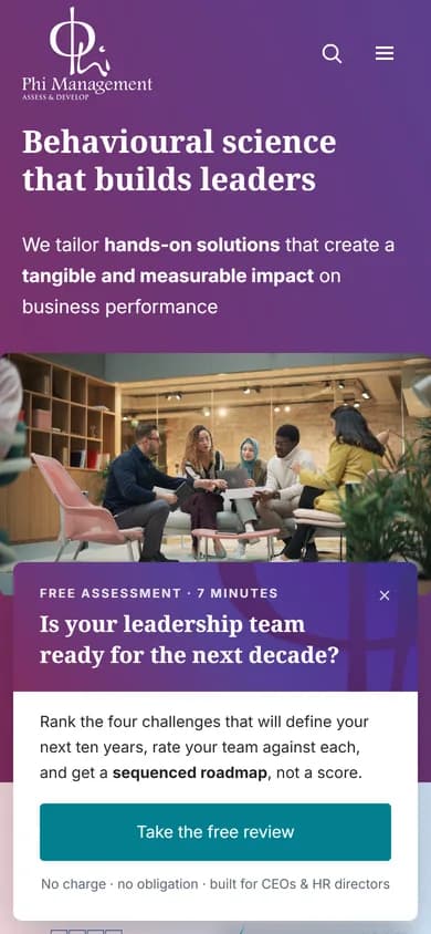 Phi Management website shown on a phone